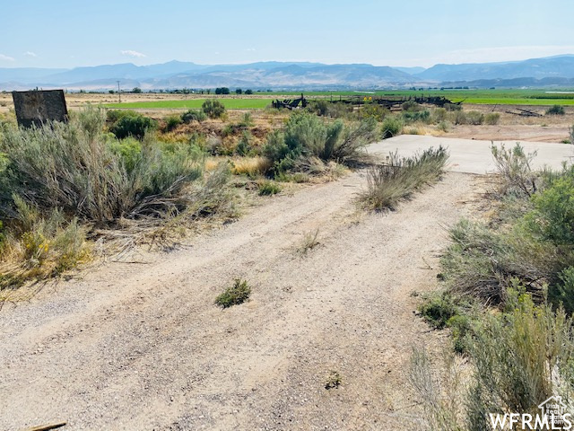 View of mountain feature with a rural view