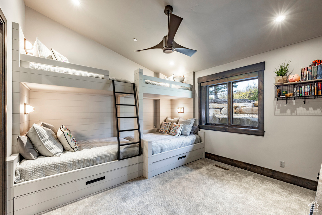 Carpeted bedroom featuring recessed lighting, lofted ceiling, baseboards, and ceiling fan