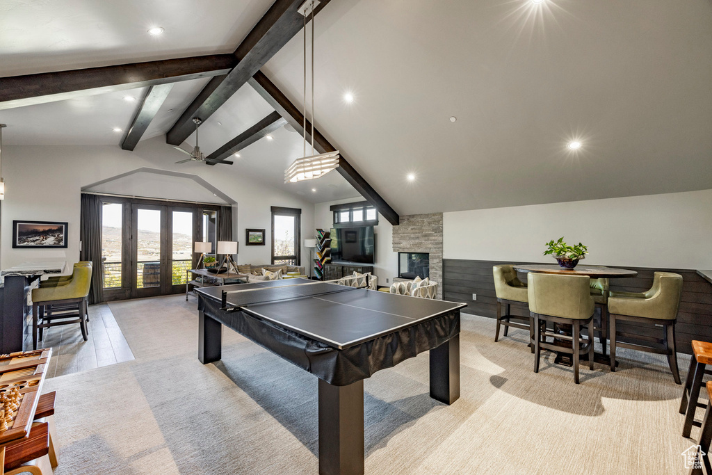 Recreation room with recessed lighting, a fireplace, french doors, pool table, and light colored carpet