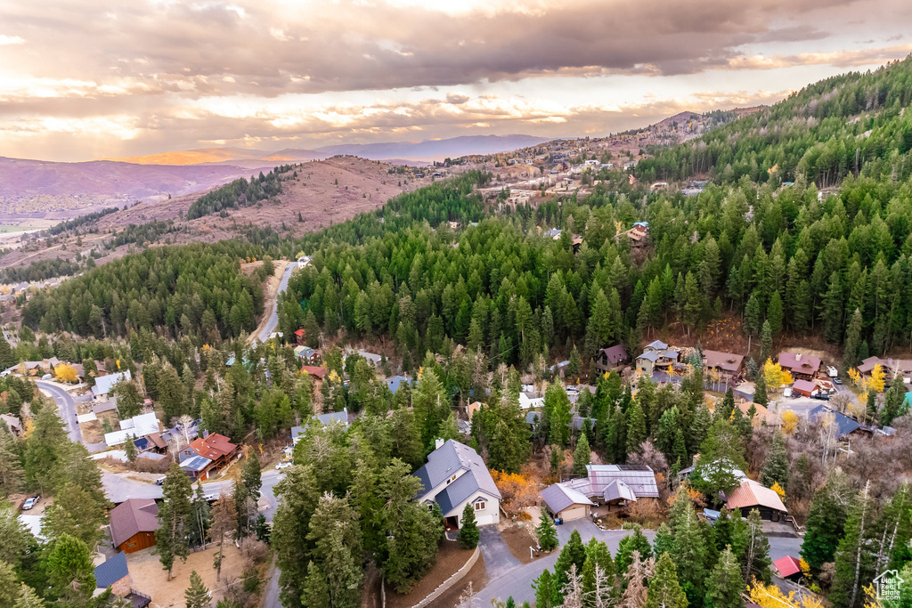 Aerial view at dusk featuring a mountain view