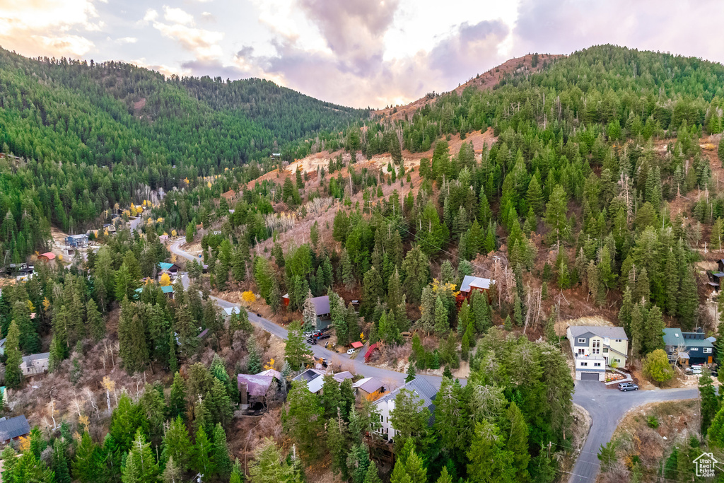 Aerial view at dusk featuring a mountain view