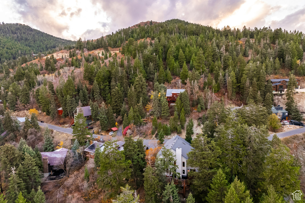 Aerial view at dusk featuring a mountain view