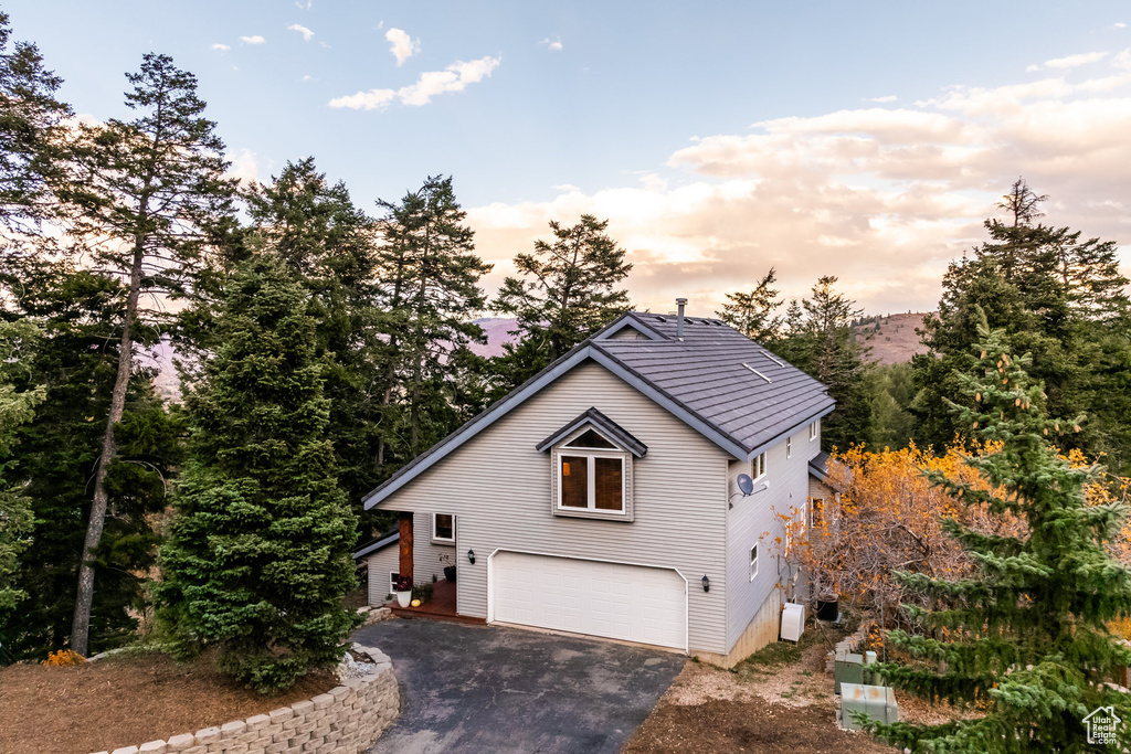View of front of home with a garage