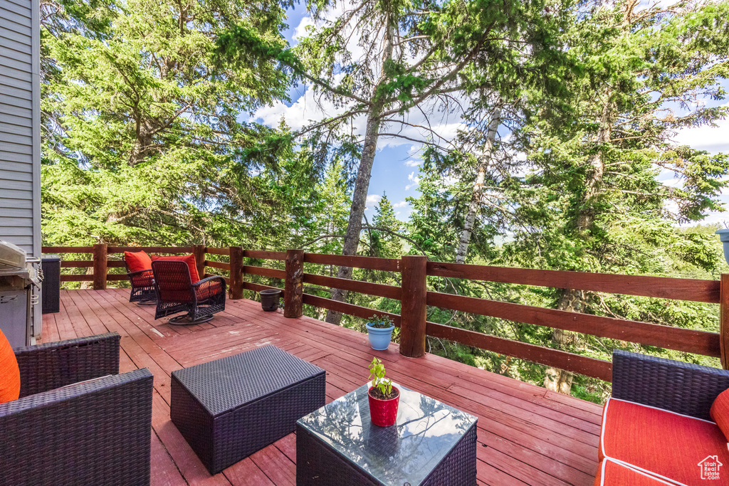 Deck featuring outdoor lounge area