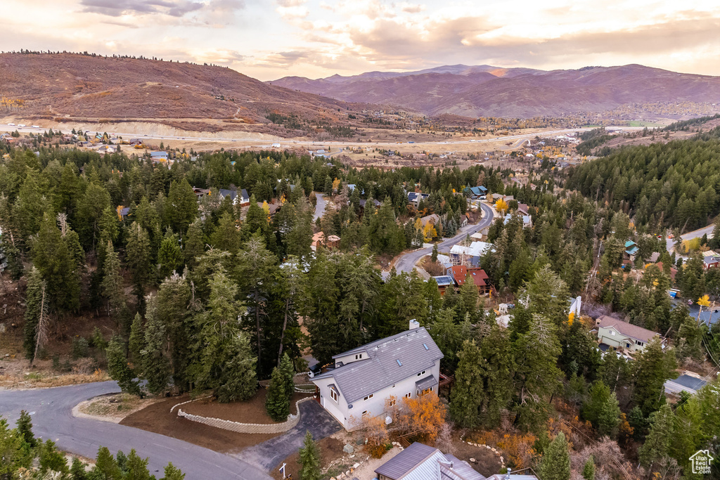 Aerial overview of property's location with a mountain backdrop