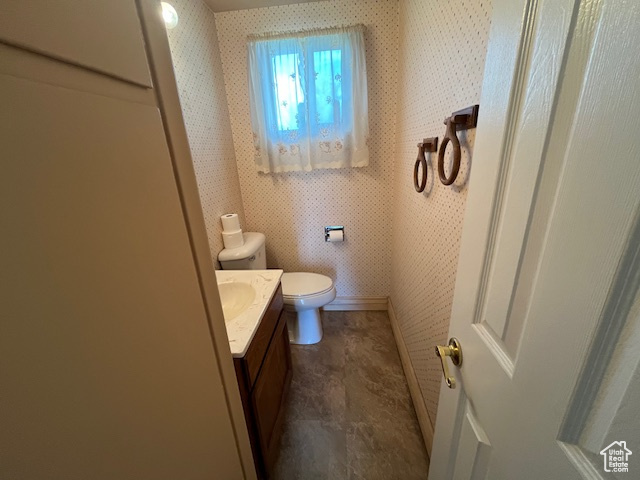 Bathroom with vanity and toilet