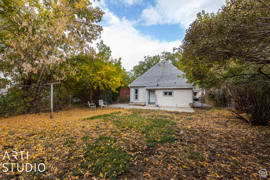 Back of property featuring a patio area