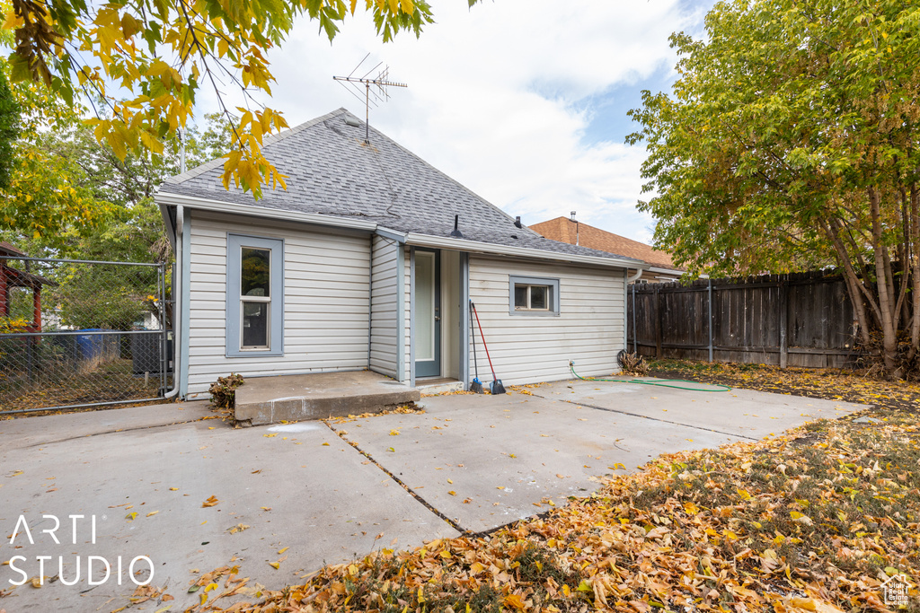 Rear view of house featuring a patio