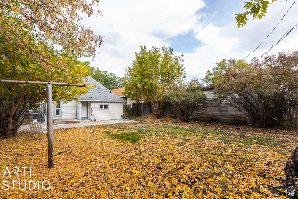 View of yard with a patio