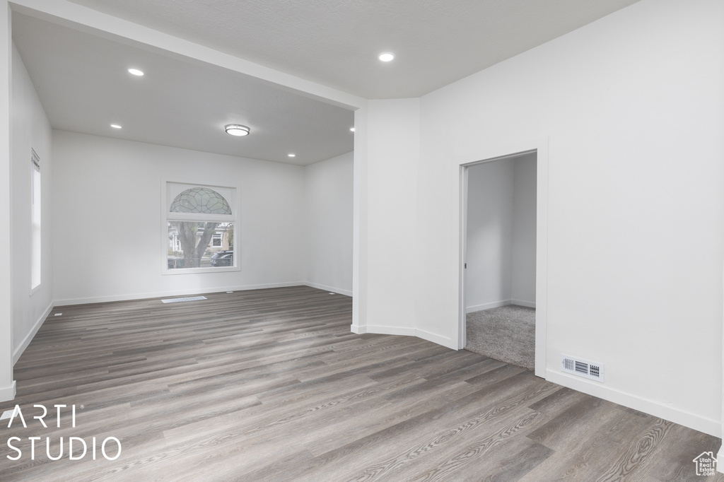 Unfurnished room featuring hardwood / wood-style flooring