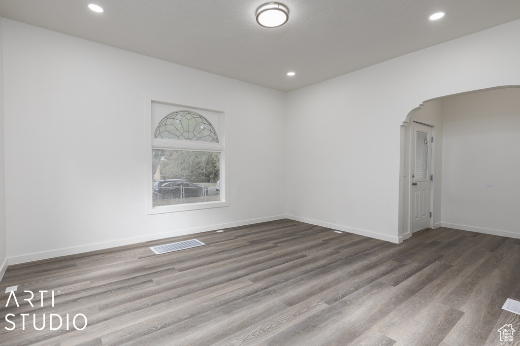 Spare room with wood-type flooring