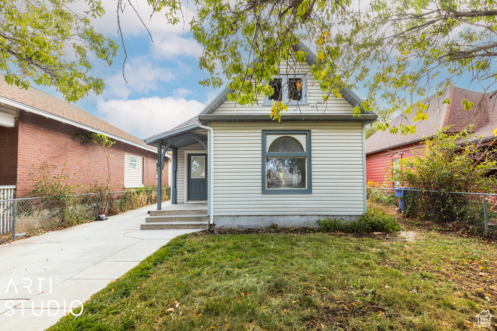 View of front of home with a front lawn