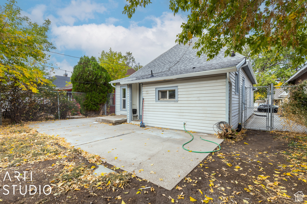 Rear view of house with a patio