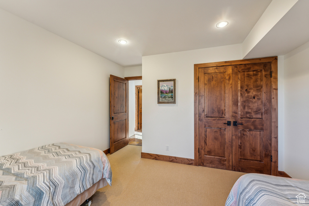 View of carpeted bedroom