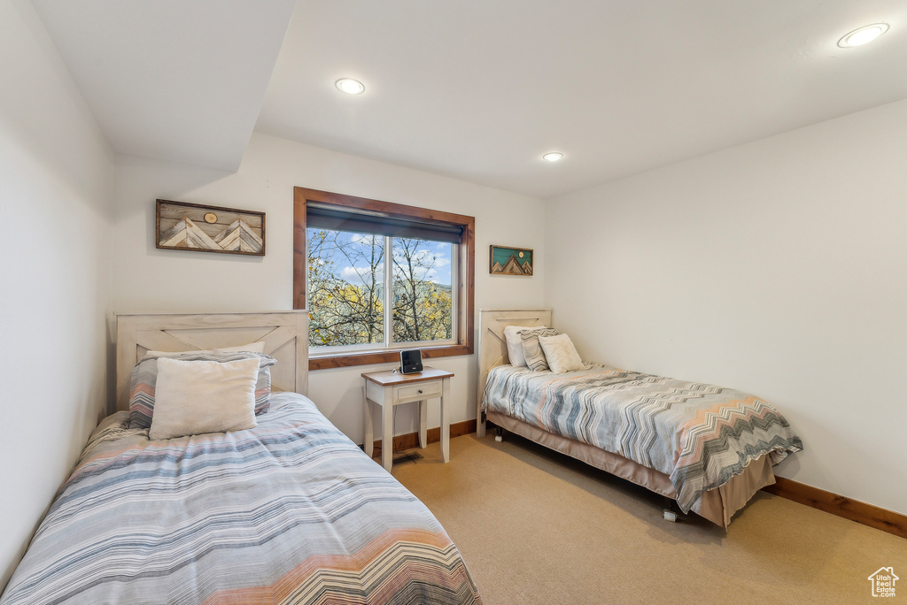 Bedroom with carpet flooring