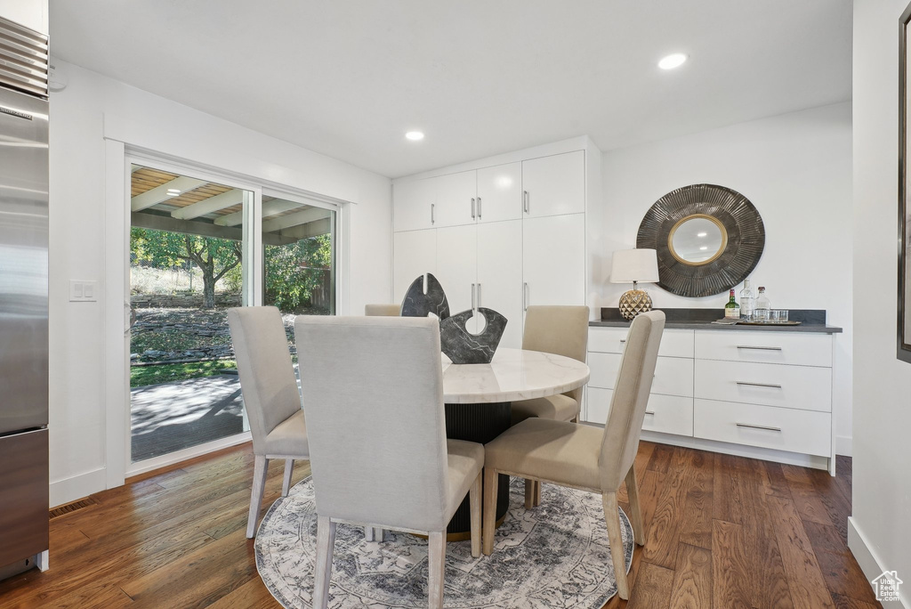 Dining room featuring dark hardwood / wood-style flooring