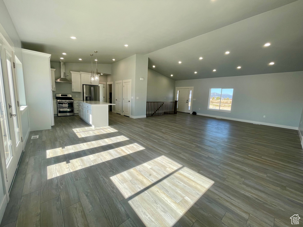 Unfurnished living room with light hardwood / wood-style floors