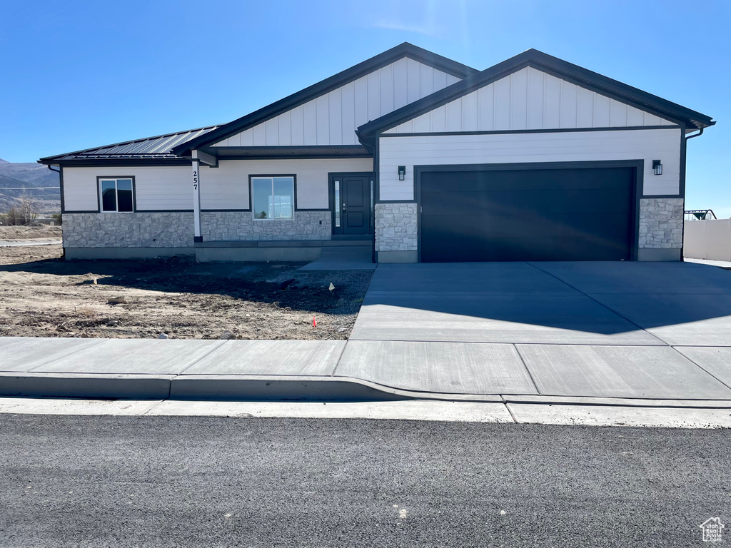 View of front of house with a garage