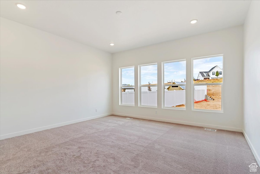 View of carpeted spare room