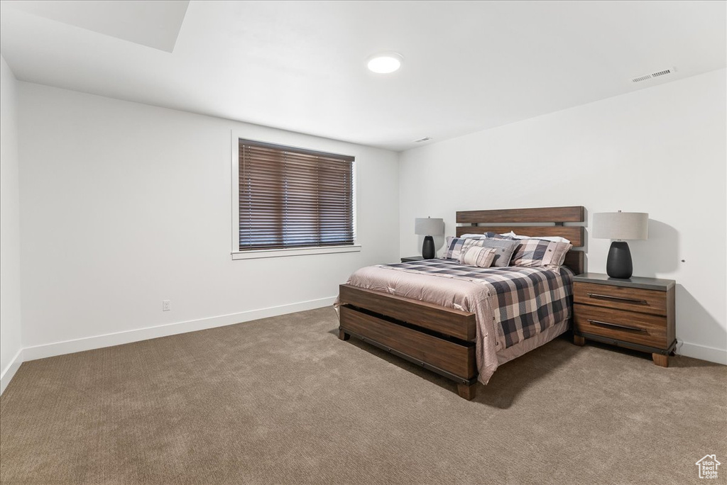 Bedroom with carpet