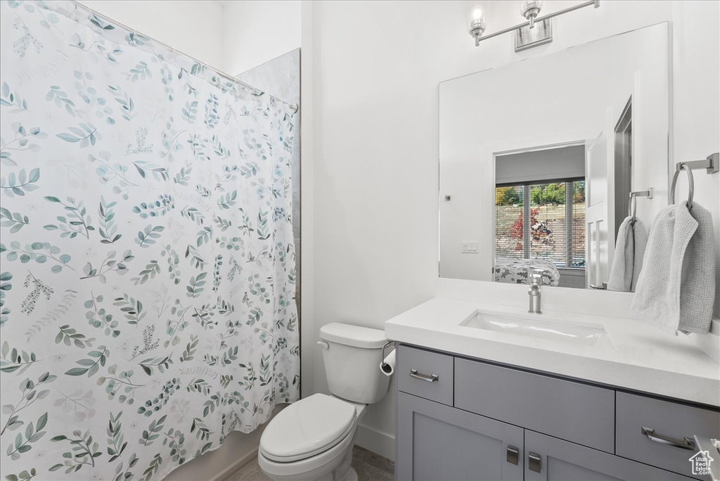 Bathroom with vanity and toilet