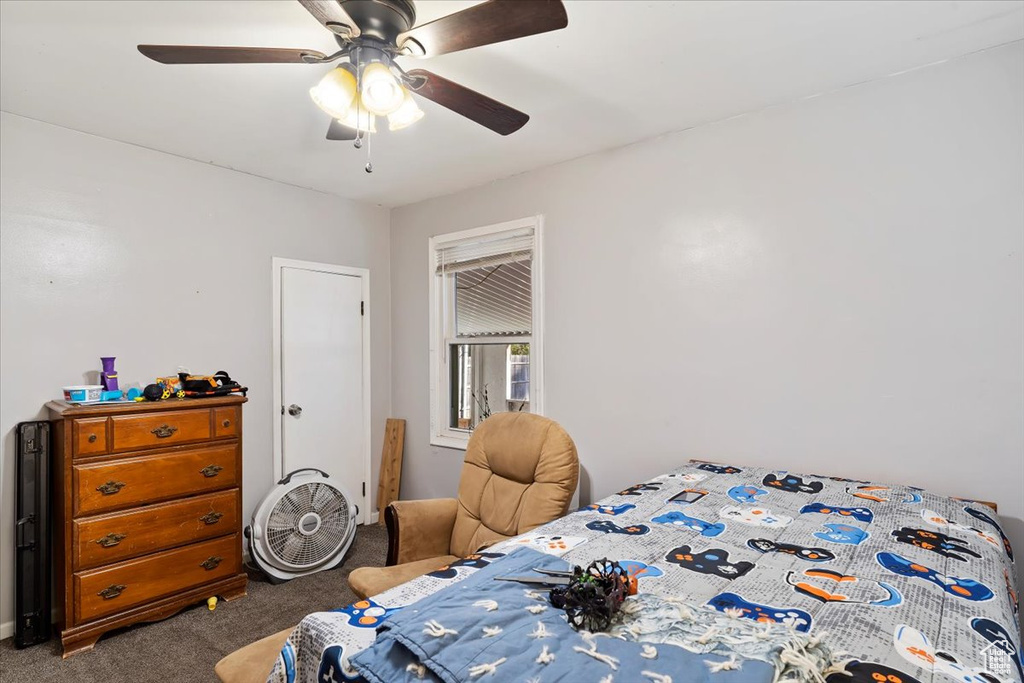 Bedroom featuring carpet floors and ceiling fan