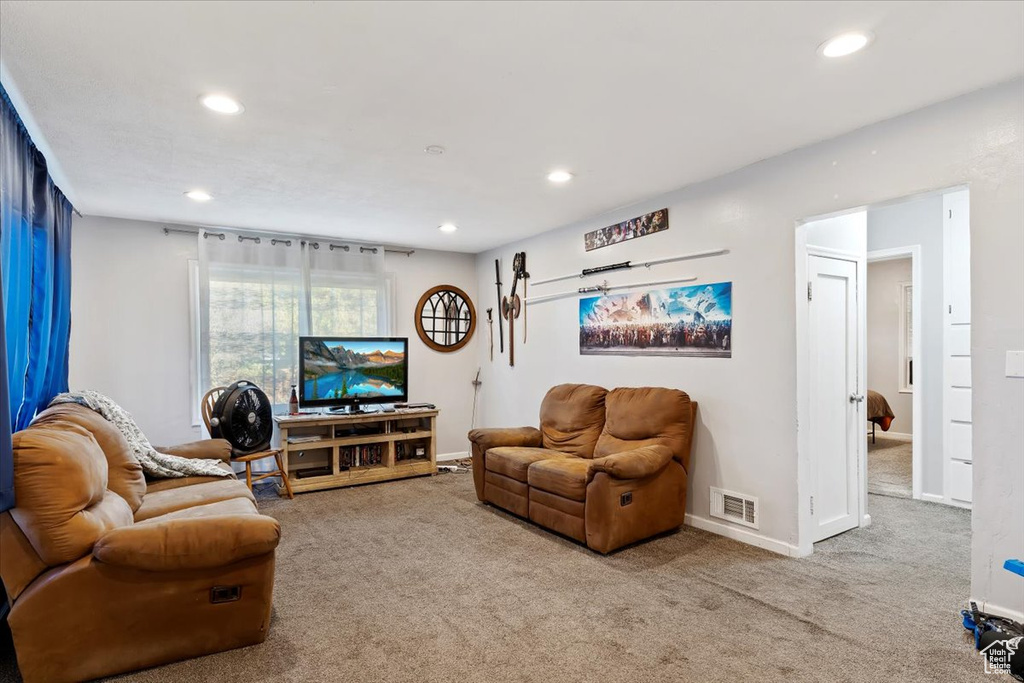 Living room featuring carpet floors