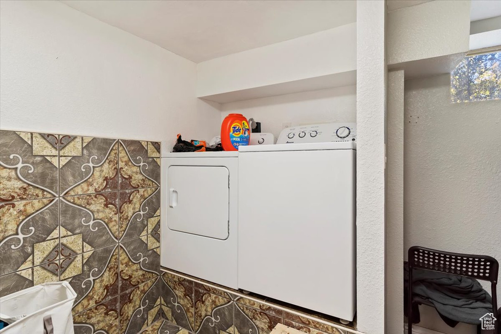 Laundry room with separate washer and dryer