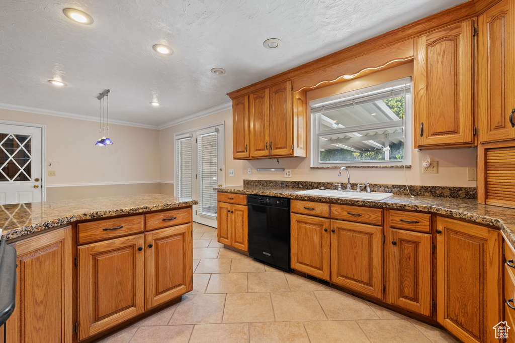 Kitchen featuring sink, dishwasher, pendant lighting, crown molding, and light tile patterned floors