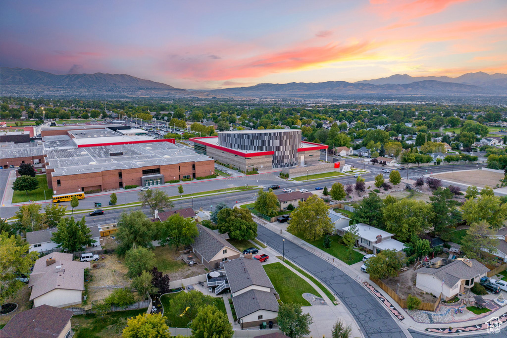 Aerial view at dusk featuring a mountain view