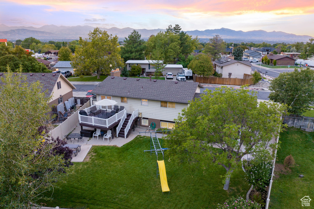 Aerial view at dusk with a mountain view