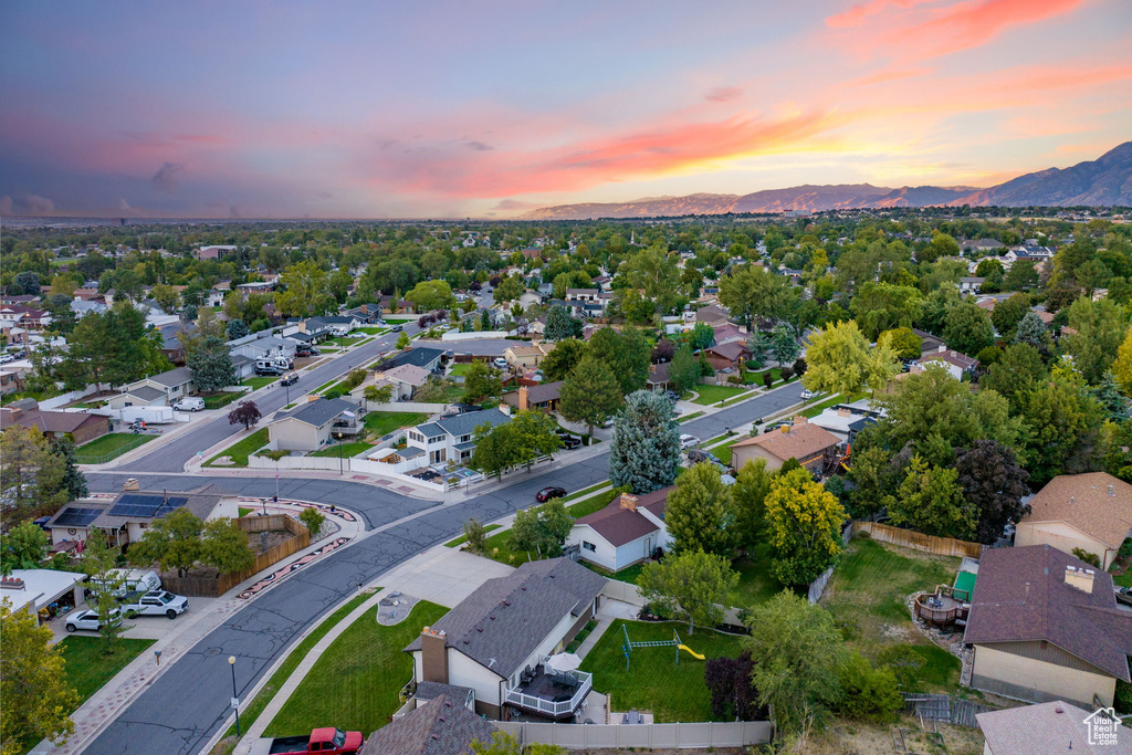 Aerial view at dusk with a mountain view