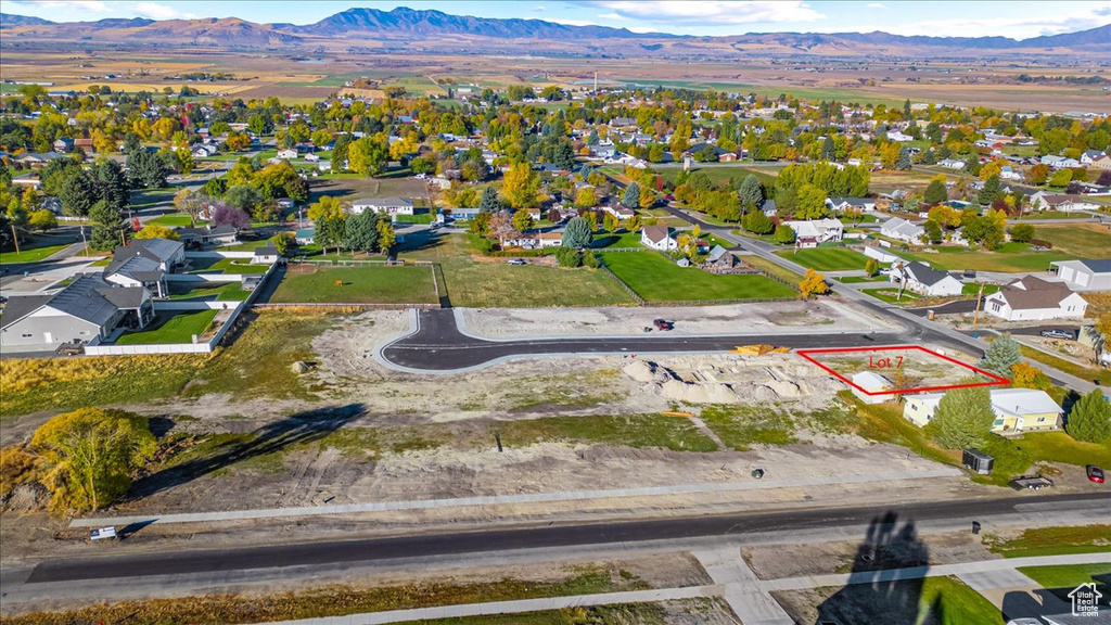 Birds eye view of property featuring a mountain view