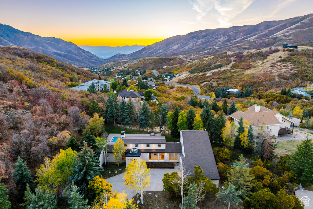 Aerial view at dusk with a mountain view