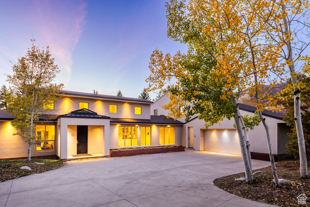 View of front of property featuring a garage