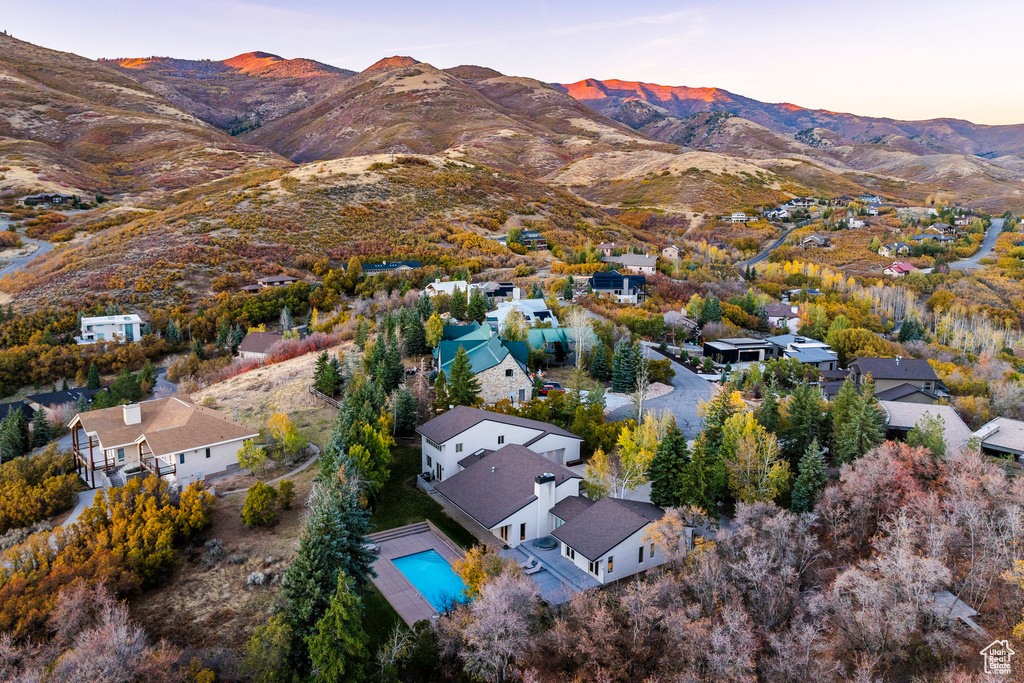 Aerial view at dusk featuring a mountain view