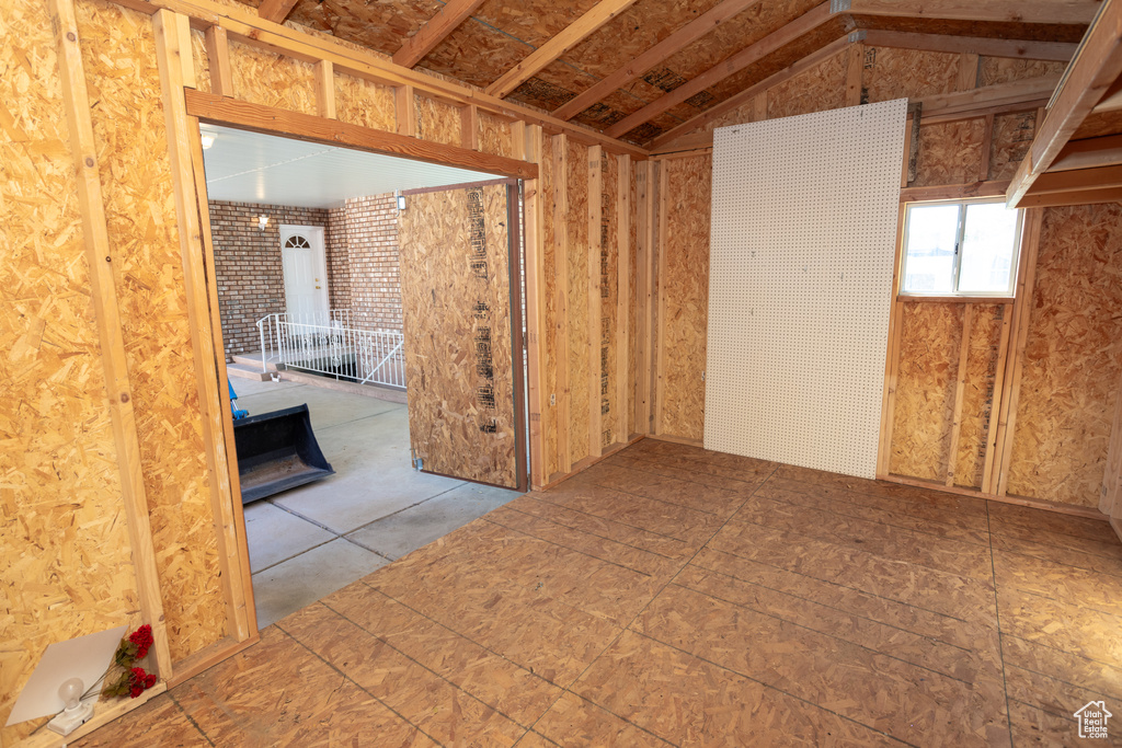 Interior space featuring vaulted ceiling