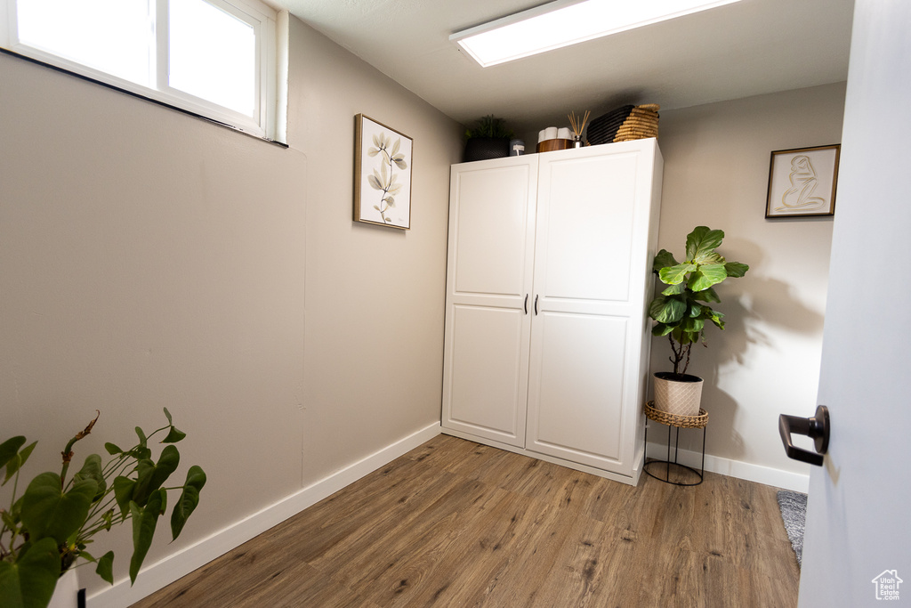 Interior space with hardwood / wood-style floors