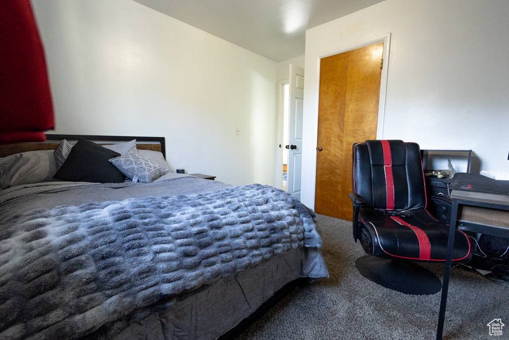 Bedroom featuring carpet flooring