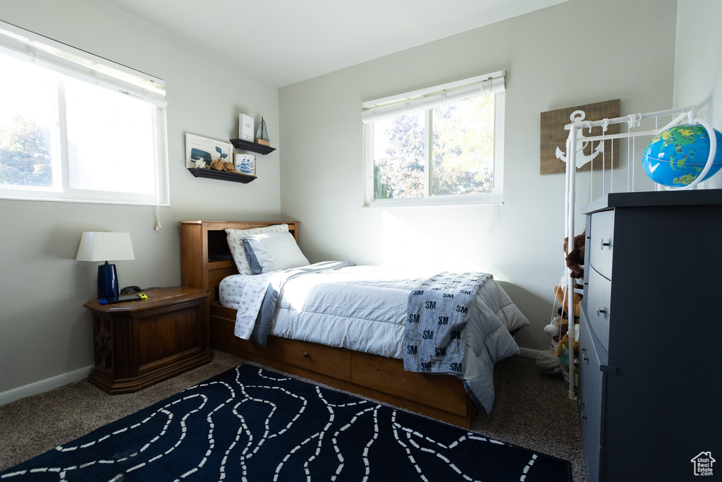 Bedroom with carpet