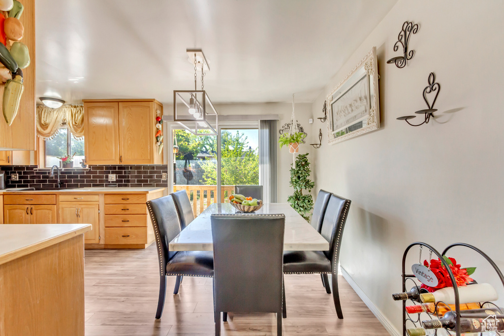 Dining room featuring light wood-type flooring