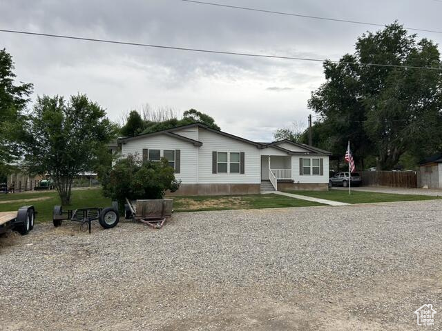 View of front of house featuring a front yard