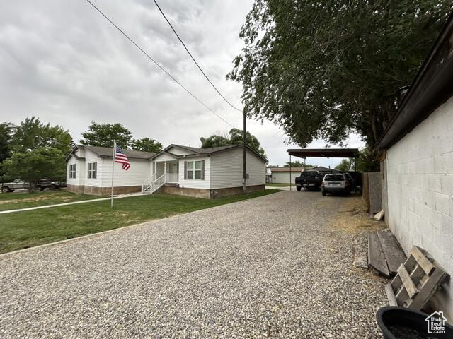 View of front of house with a front yard