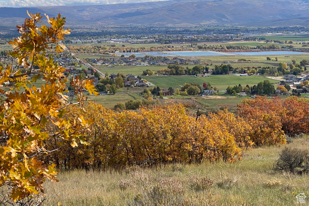 Mountain view featuring a water view and a rural view