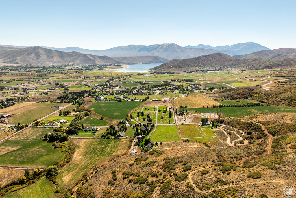 Bird's eye view featuring a water and mountain view and a rural view