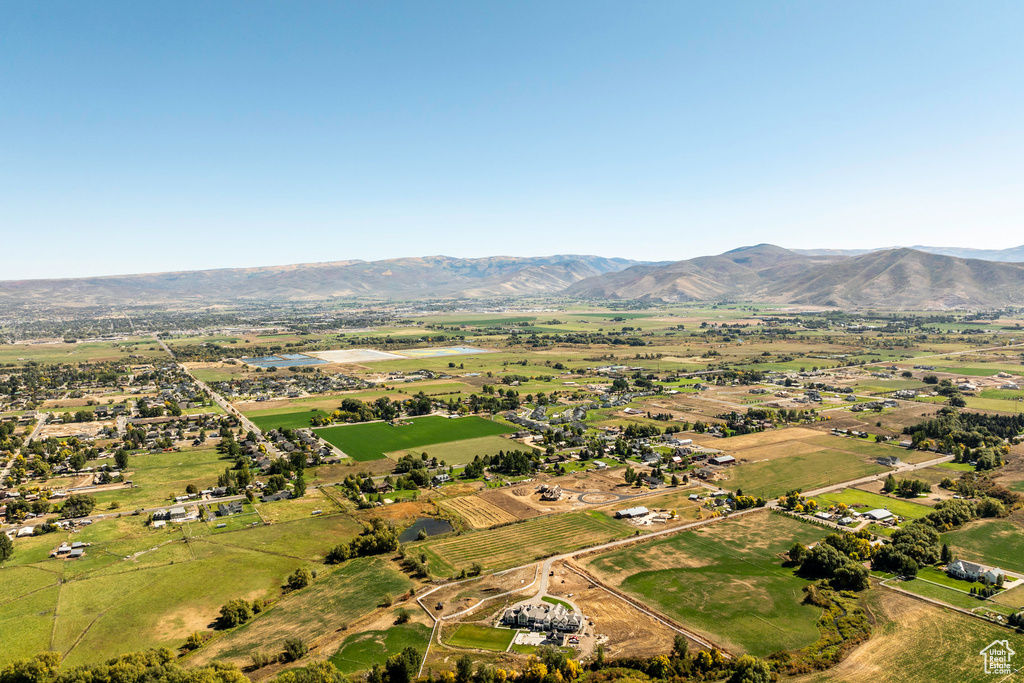 Aerial view featuring a rural view and a mountain view