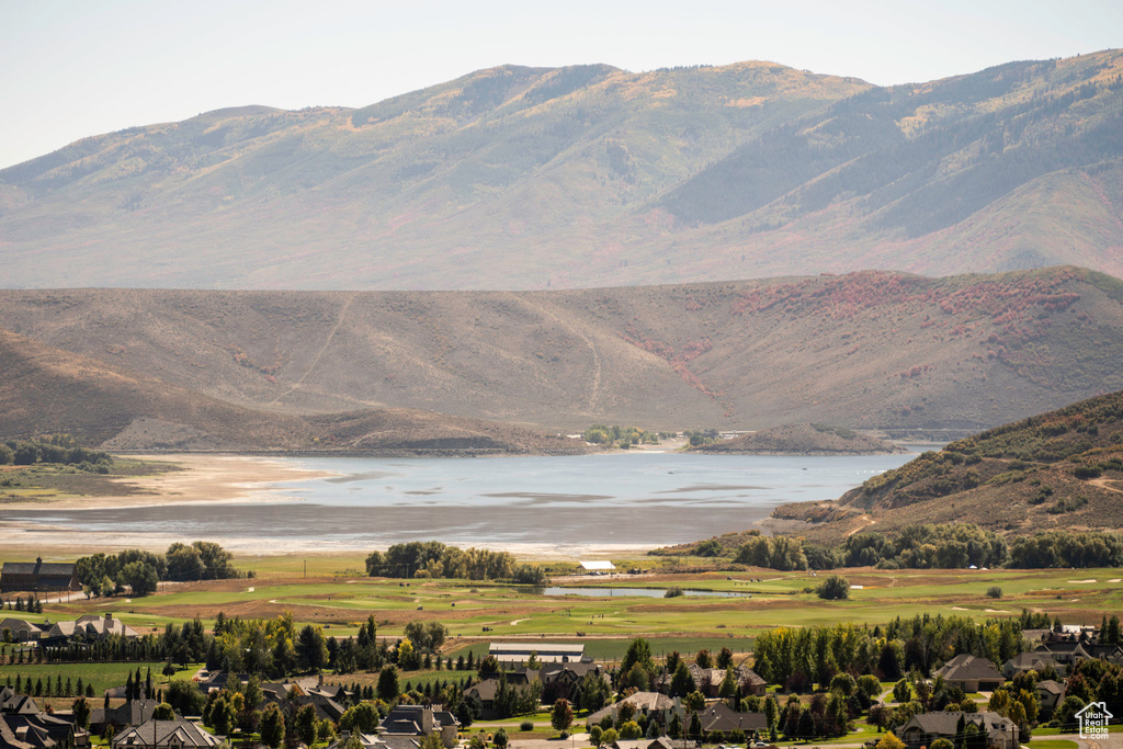 Mountain view featuring a water view