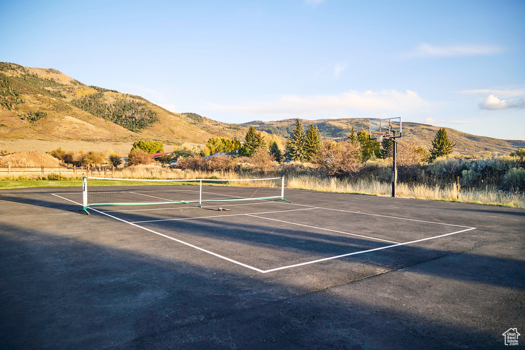 View of sport court with a mountain view