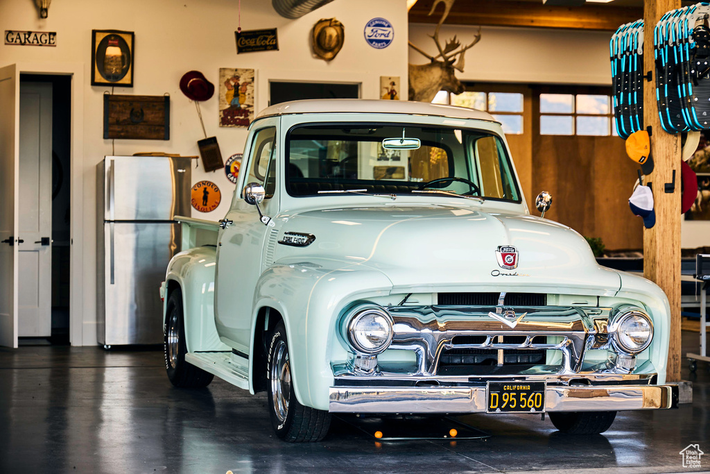 Garage with stainless steel fridge