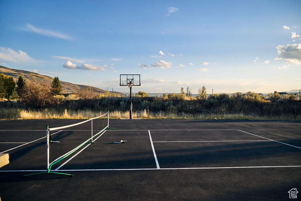 View of sport court with a mountain view